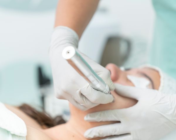A facial treatment in progress in one of the Aura treatment rooms.