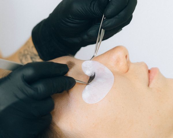 A lash lift and tint treatment in progress.