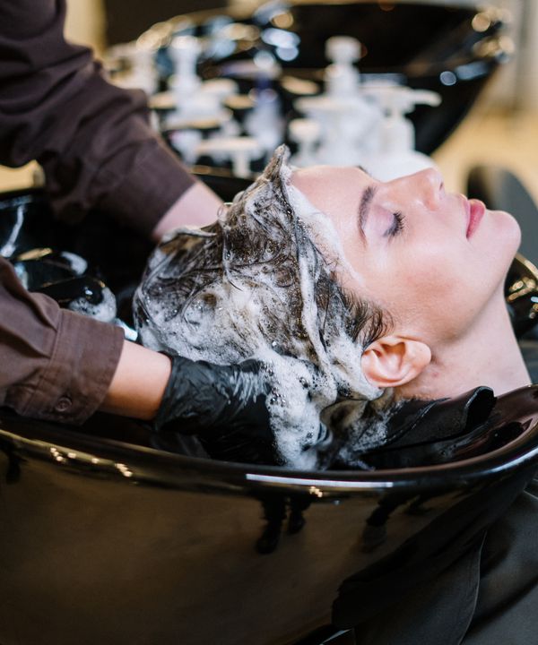 Face-framing highlights finished with a gloss toner