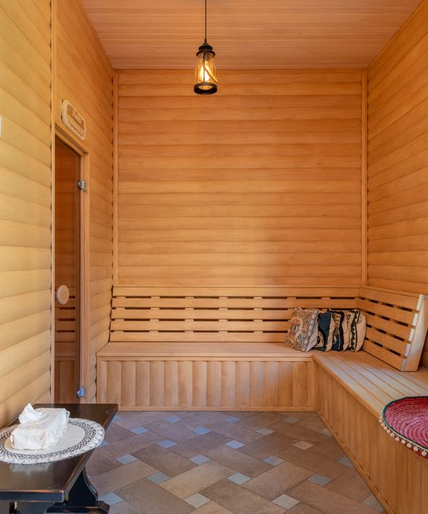 Inside a warmly lit sauna