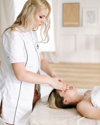 A facial massage in progress